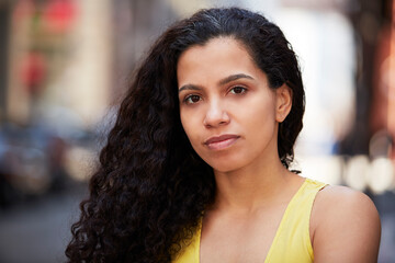 Close up of serious Mixed Race woman