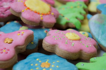 flower shaped ginger cookies on a plate	