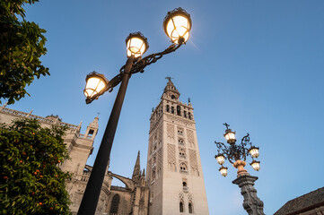Spain, Seville, Low angle view of Giralda tower at dusk