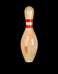 Wooden pin for bowling isolated on a black background