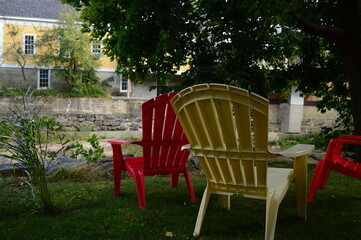 Obraz premium Adirondack chairs and tables