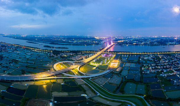 Jiangmen city, guangdong province, binjiang bridge and city at night