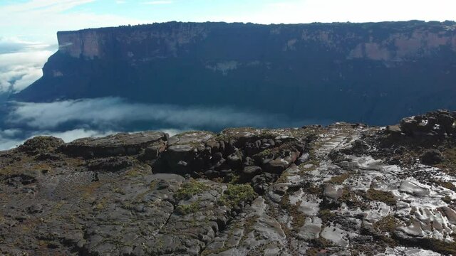 Scenic View Of The Mount Roraima Surrounded By White Clouds During Summer In Venezuela, South America. - aerial drone - slow forward
