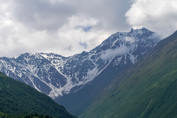 Fototapeta na wymiar Glacier in the Rocky Mountain Range of Caucasus, Russia