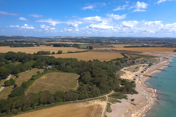 Aerial View along the West Sussex coastline towards Climping on a warm and sunny summers day.