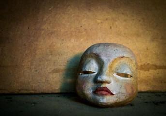 Portrait of a woman with a mask