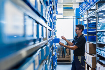 Man in storage room of a factory