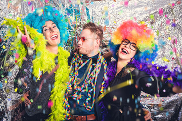 happy young party people group with wigs and glasses 