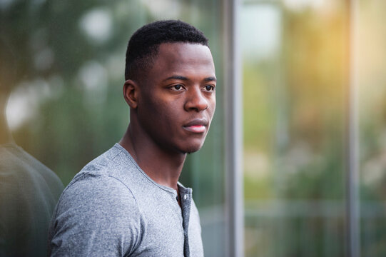 Portrait Of Young Man Looking Sideways