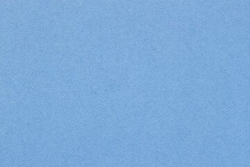 Texture of artistic paper, soft light blue color. Recyclable material. Fashionable background