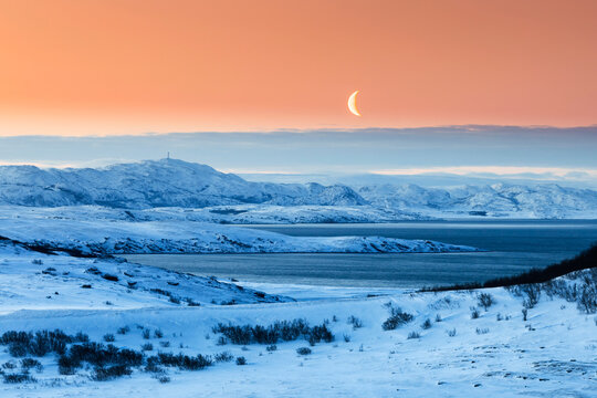 Morning mood with moon in winter, Lebesby, Lakse Fjord, Norway