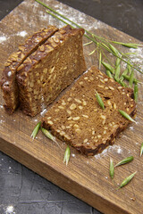 Fitness bread with seeds lies on a wooden Board.