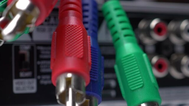Audio Video Component RCA Connectors On The Back Side Of DVD Player And Component Video Cables Slider Shot.