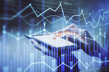 Double exposure of forex chart sketch hologram and woman holding and using a mobile device. Financial market concept.
