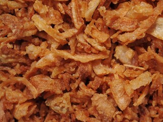 Full frame. Iew of fried onions
