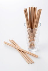 Paper straws on a white background