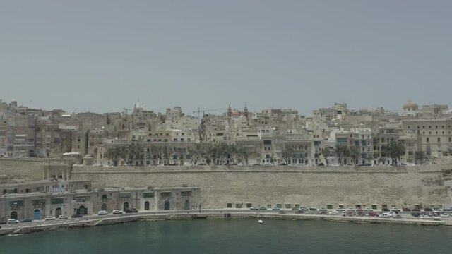 Drone flying from the sea to old city Valletta, Malta island. Old, vintage windows, balconies. Amazing view from above. Stock video
Europe, Malta, Valletta, 4K Resolution, Above