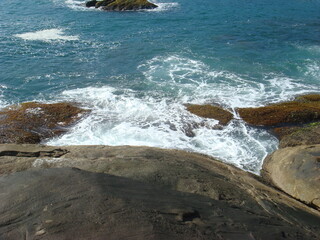 waves crashing on rocks