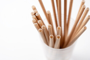 Paper straws in a glass.