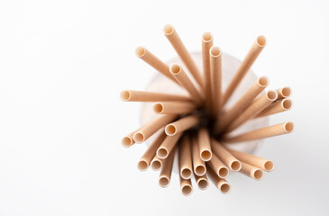 Paper straws in a glass.