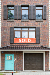 Obraz premium modern typical house with a banner 