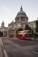 facade of St Pauls Cathedral with red London bus