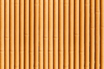 Close - up of Bamboo wall or Bamboo fence texture. Old brown tone natural bamboo fence texture background