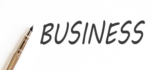 ink pen on the paper with text BUSINESS