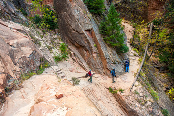 Zion, Utah - 10/28/2009: Hikers on the Hidden Canyon trail in Zion National Park, Utah