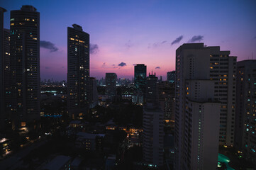 Fototapeta na wymiar Bangkok clear city view at sunset with purple sky