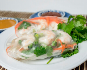 Plate of Vietnamese shrimp spring rolls on a plate.