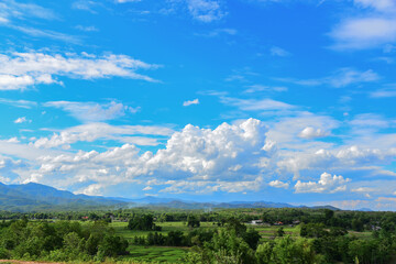 Blue sky with white clouds, beautiful scenery of hills wits lust green forests and aerial nature