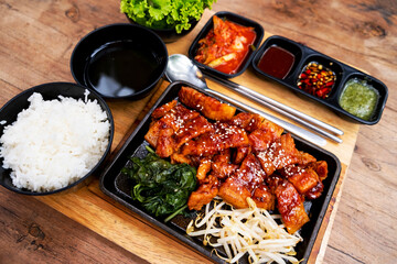 Korean grilled pork set meal with rice and side dishes