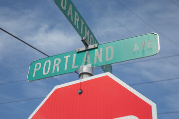 Old Stop Sign and Crossroad Street Signs Portland Ave and Dartmouth St in Gladstone, OR