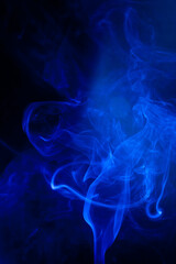 Blue smoke motion on black background.