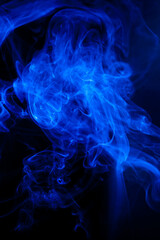 Fototapeta premium Blue smoke motion on black background.