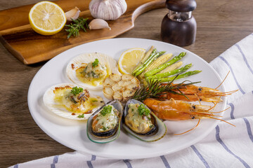 BBQ seafood and vegetables on the chopping board