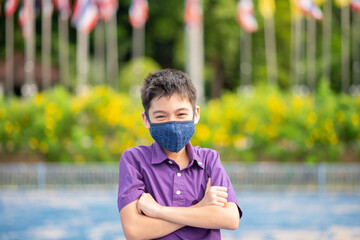 Asian mix rate walking at school wearing mask protect from virus new normal