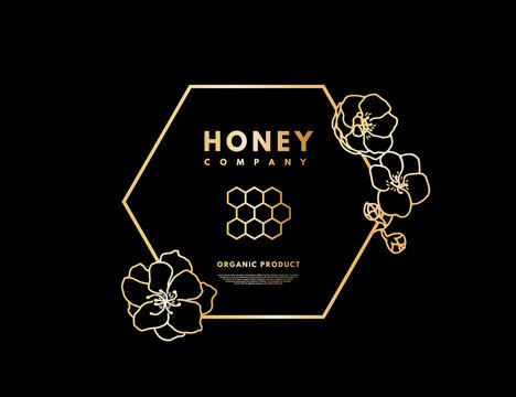 Honey logo with gold gradient honeycombs in frame hexagon with flower. Label banner for company isolated from black background. Vector illustration. 