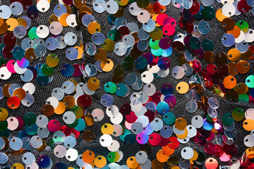 Background of shimmering rhinestones on the textile surface