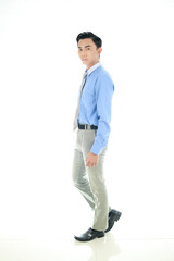 Confidence and business concept. Portrait of charming successful young entrepreneur in blue-collar shirt, smiling broadly with self-assured expression isolated White Background. Indonesian People