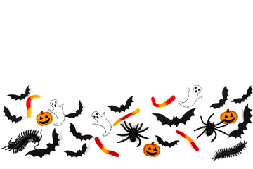 Halloween mock up concept frame  Flying black paper bats , beetles and spiders, candys, pumpkins and ghosts on white background.