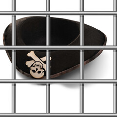 Pirate hat against the backdrop of prison bars.International terrorism