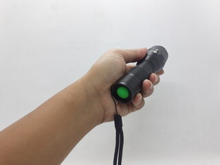 Black Military Style Technical Stainless Steel LED Bright Electric Flashlight in White Isolated Background