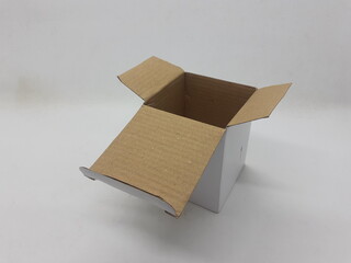 Cardboard Box for Packaging and Storage Purpose in White Isolated Background