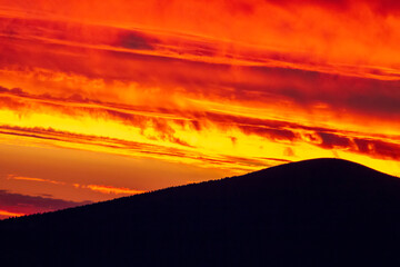 Fiery sky glow Beautiful color of sunset.
