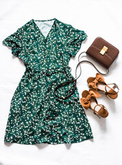 Women's summer clothing - green dress on the smell, suede brown sandals, cross body leather bag on...