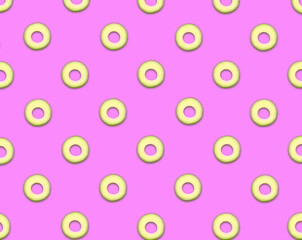 Pattern of avocado slices on pale fuchsia background