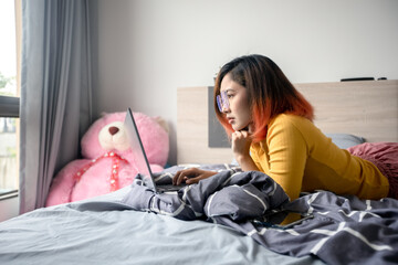women use laptop working from home.