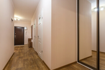 doors in modern entrance hall of corridor in expensive apartments